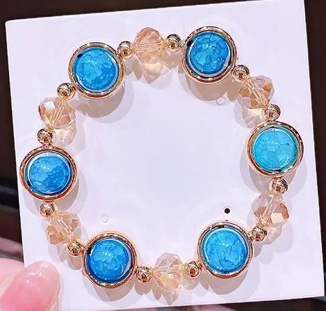 Bracelets 01 B552 Gold Light Blue Gem Bracelet