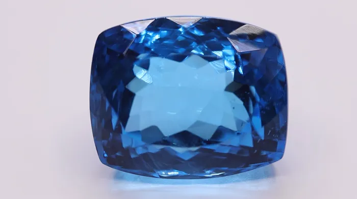 Fire Brilliance Rings 1870 x 1548 Cushion Blue Topaz