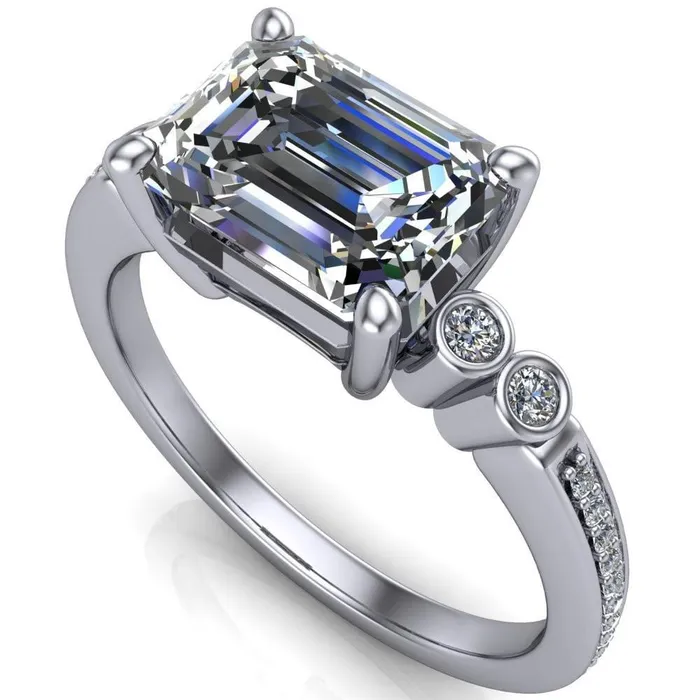 Fire Brilliance Rings Philippa Emerald Center Stone 4 Prong Under Bezel Multi Stone Engagement Ring
