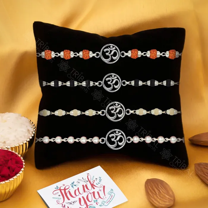 Trendy 925 sterling silver unique style Aum or OM pendant Rakhi bracelet in rudrakshblack basilwhite basil and silver beaded chain rk270 TRIBAL ORNAMENTS Bracelets Trendy 925 sterling silver unique style Aum or OM pendant Rakhi bracelet in rudrakshblack basilwhite basil and silver beaded chain rk270 TRIBAL ORNAMENTS Bracelets