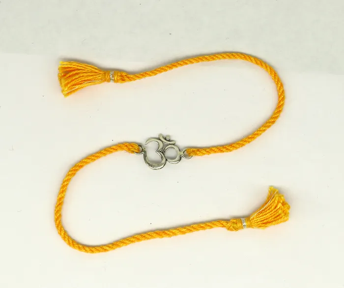 TRIBAL ORNAMENTS Bracelets 925 sterling silver custom design OM AUM design Rakhi bracelet with stunning yellow thread Best sibling rakhi for Festival Rakshabandhan rk161