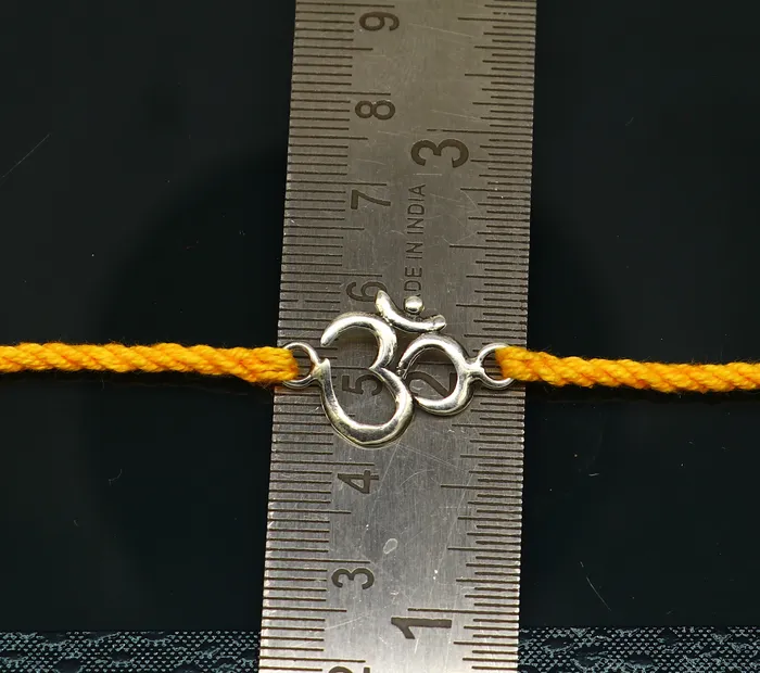 TRIBAL ORNAMENTS Bracelets 925 sterling silver custom design OM AUM design Rakhi bracelet with stunning yellow thread Best sibling rakhi for Festival Rakshabandhan rk161