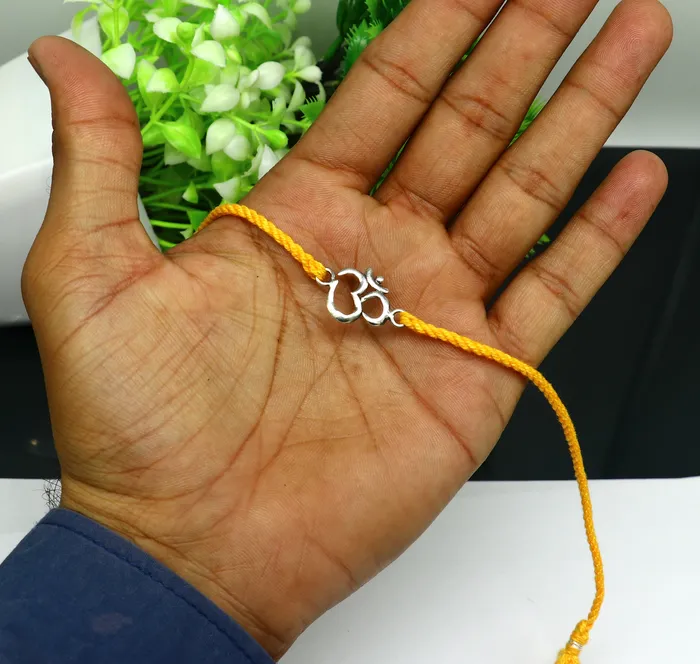 TRIBAL ORNAMENTS Bracelets 925 sterling silver custom design OM AUM design Rakhi bracelet with stunning yellow thread Best sibling rakhi for Festival Rakshabandhan rk161